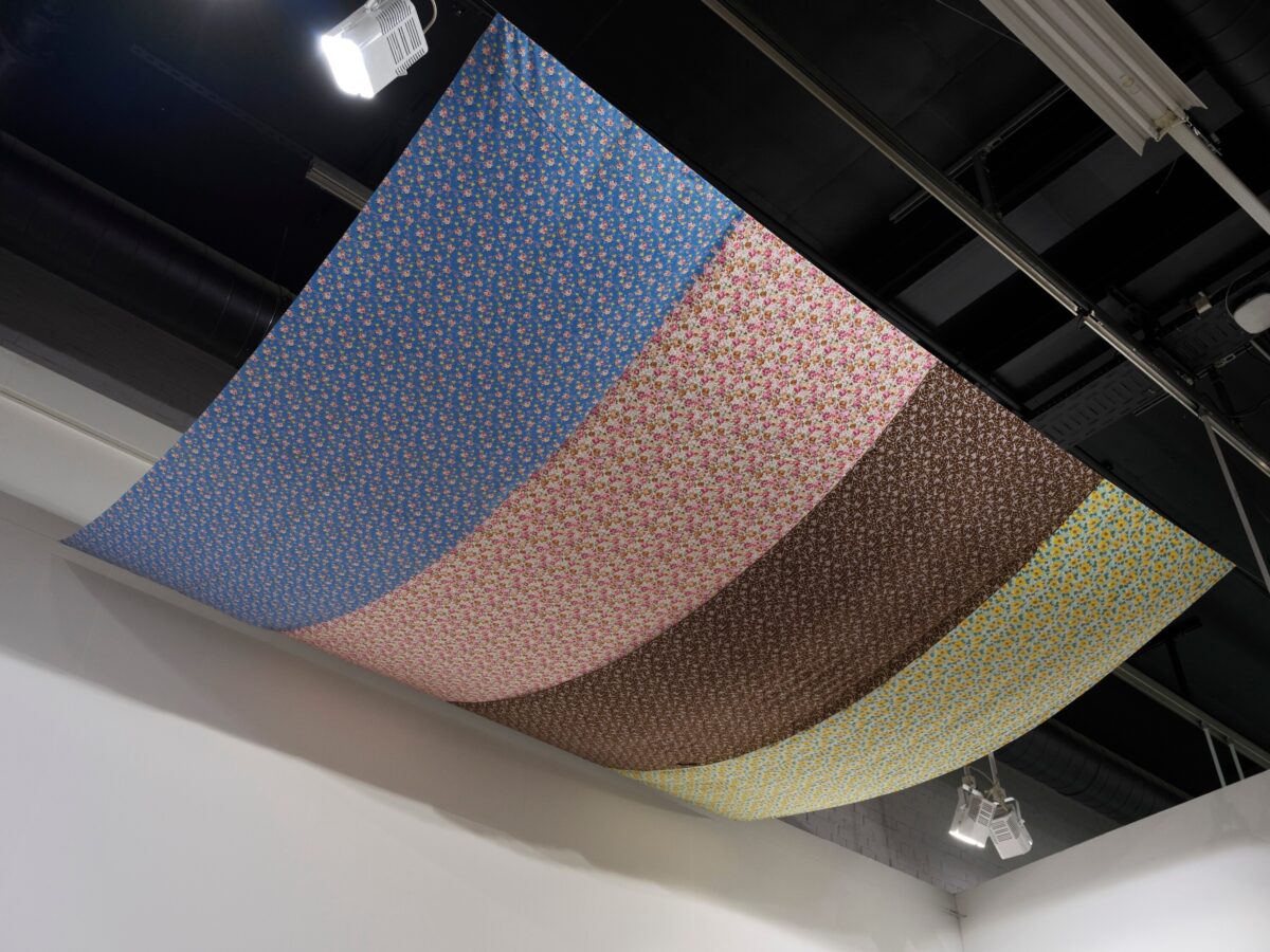 This image depicts an artwork by Tina Girouard titled "Air Space Stage." This artwork was created in 1972 and measures 144" x 144" [HxW] (365.76 x 365.76 cm). Its medium is Solomon's Lot fabrics.