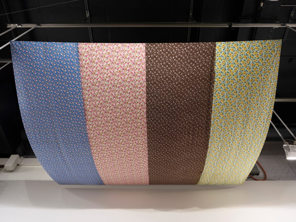 This image depicts an artwork by Tina Girouard titled "Air Space Stage." This artwork was created in 1972 and measures 144" x 144" [HxW] (365.76 x 365.76 cm). Its medium is Solomon's Lot fabrics.